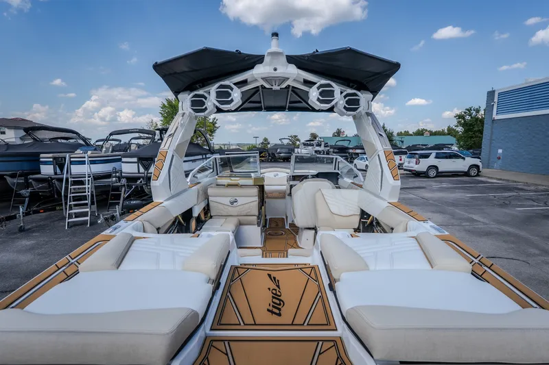 Slide: The Image of 2027 Tigé Ultré 23ZX boat interior with luxurious seating and modern design. - 28