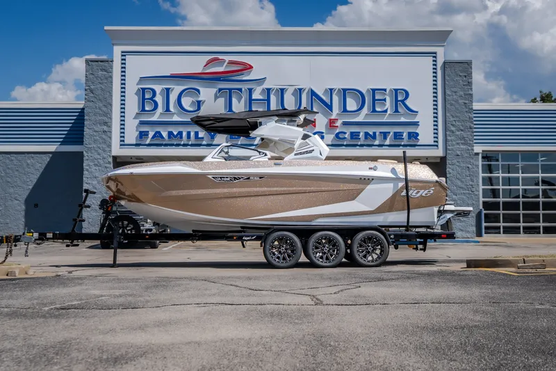 The Image of 2027 Tigé Ultré 23ZX boat on trailer at Big Thunder Marine Center. - 1