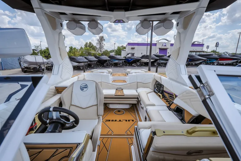 Slide: The Image of 2027 Tigé Ultré 23ZX boat interior with luxurious seating and modern design. - 76