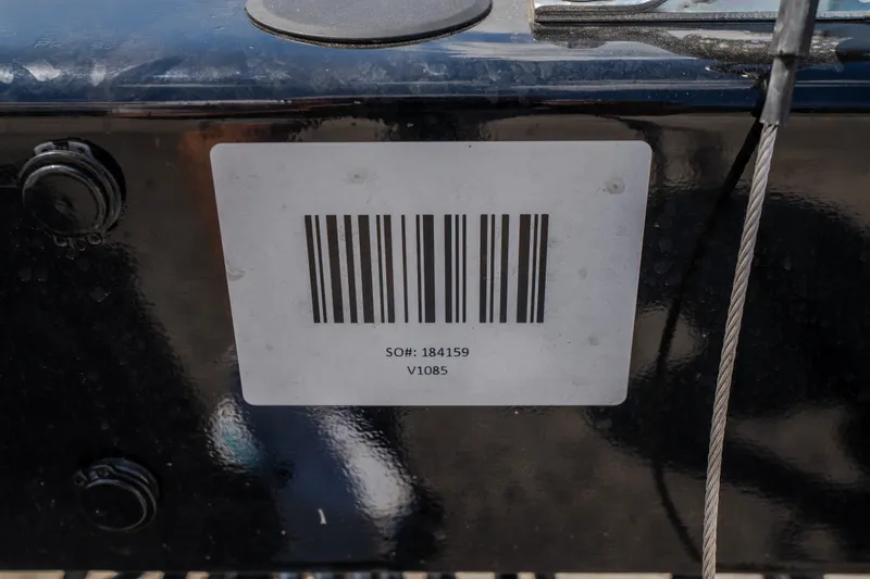 Slide: The Image of Barcode label on 2027 Tigé Ultré 23ZX boat surface. - 66