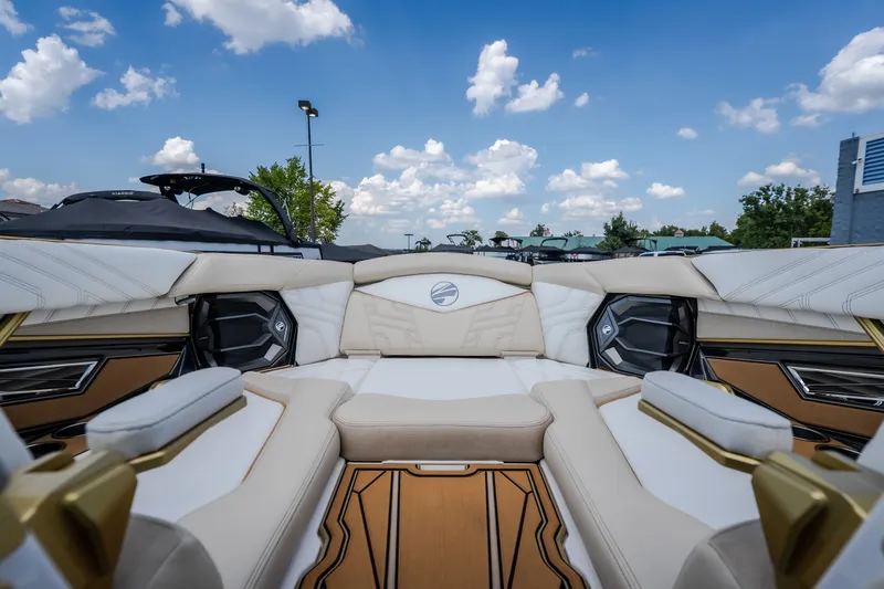 Slide: The Image of Luxurious interior of 2027 Tigé Ultré 23ZX boat with plush seating and modern design. - 69