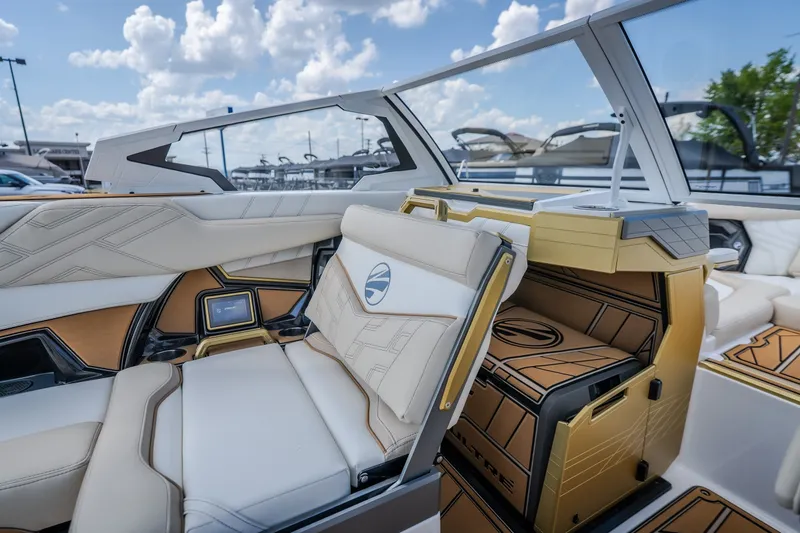 Slide: The Image of Luxurious interior of 2027 Tigé Ultré 23ZX boat with modern seating and sleek design. - 43