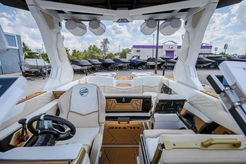 Slide: The Image of Luxurious interior of 2027 Tigé Ultré 23ZX boat with modern design and seating. - 77
