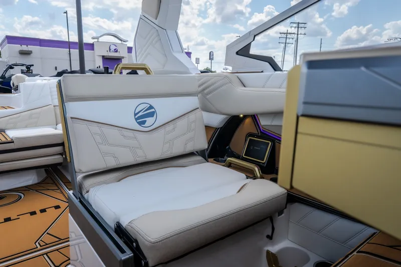Slide: The Image of 2027 Tigé Ultré 23ZX boat interior with luxurious seating and modern design elements. - 54