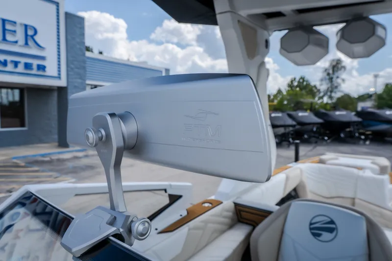 Slide: The Image of 2027 Tigé Ultré 23ZX boat interior with PTM Watersports mirror and seating. - 53