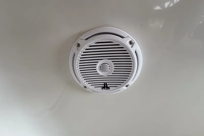 Slide: The Image of White speaker installed on a 1990 Cruise-A-Home Corsair boat interior. - 16