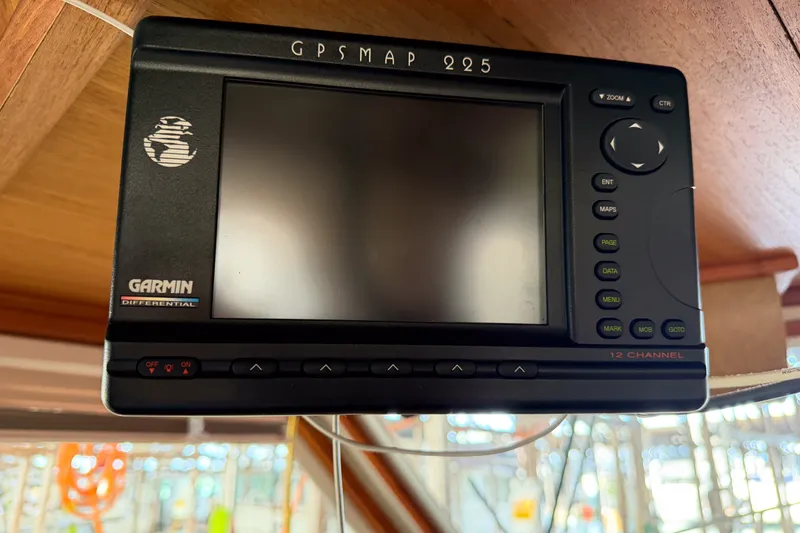 Slide: The Image of Garmin GPSMAP 225 device inside a 1990 Cruise-A-Home Corsair boat. - 38