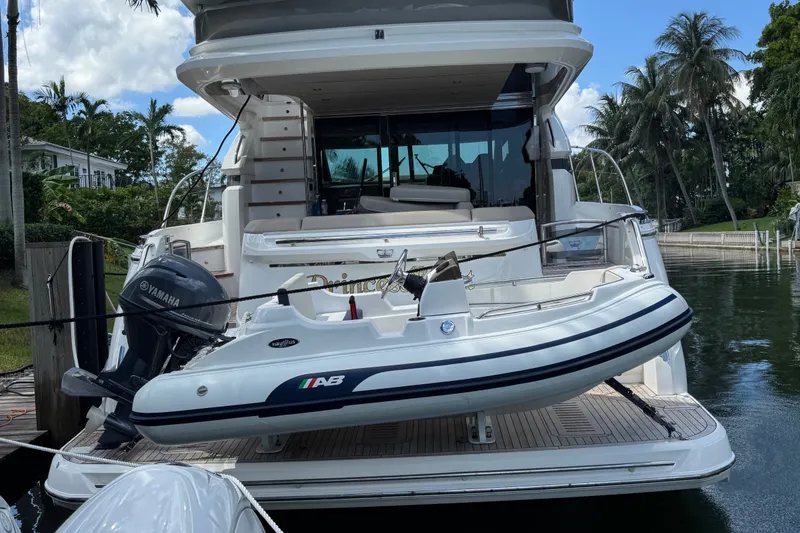 The Image of 2024 AB Inflatables Nautilus 11 DLX on yacht deck, featuring Yamaha outboard motor. - 0