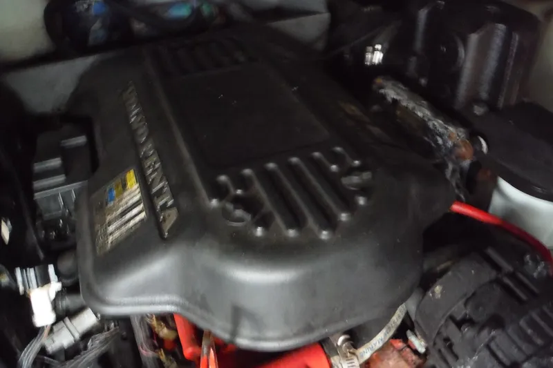 Slide: The Image of Engine compartment of a 2007 Monterey 330 Sport Yacht, featuring Volvo Penta components. - 34