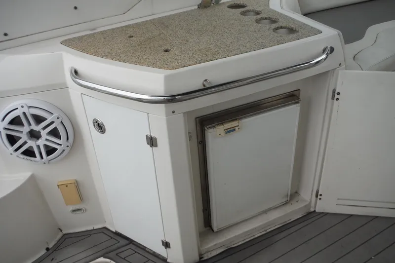 Slide: The Image of 2007 Monterey 330 Sport Yacht interior with kitchenette and speaker system. - 39