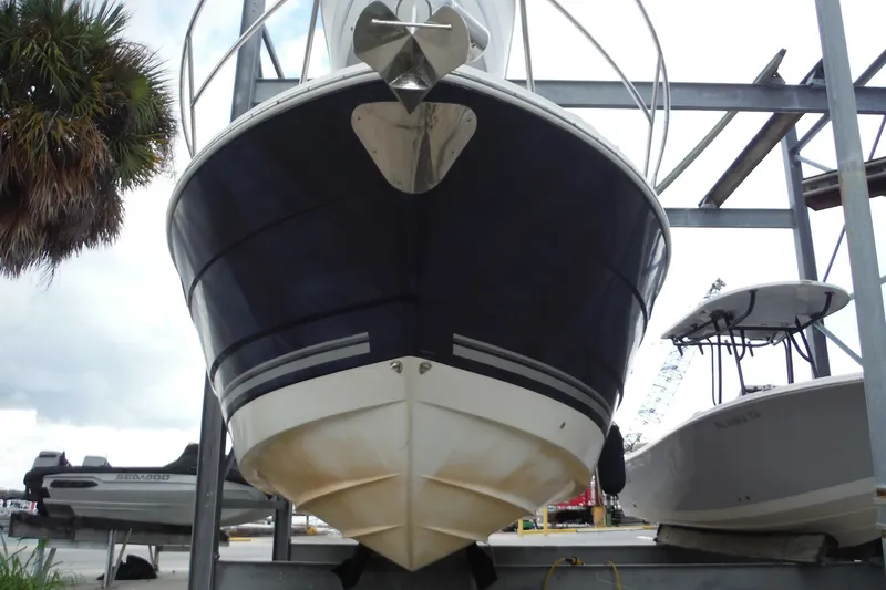 Slide: The Image of 2007 Monterey 330 Sport Yacht on dry dock, front view with anchor. - 4