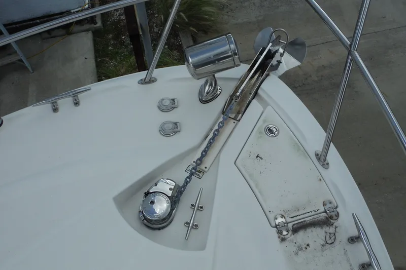 Slide: The Image of Bow of 2007 Monterey 330 Sport Yacht with anchor and chain mechanism. - 17