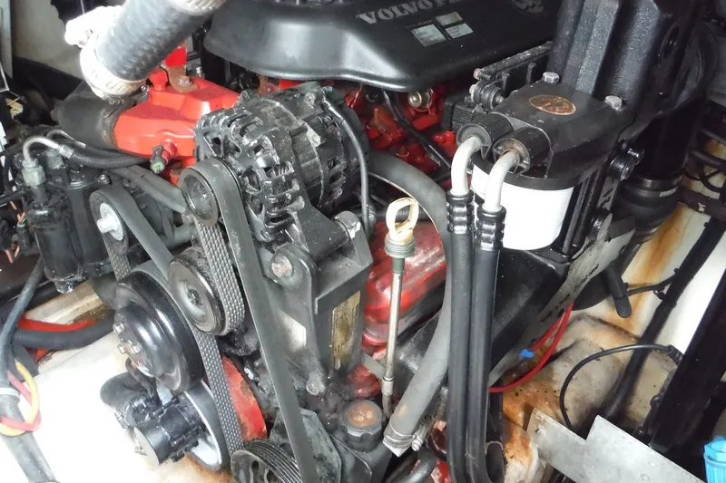 Slide: The Image of Engine compartment of a 2007 Monterey 330 Sport Yacht, featuring a Volvo Penta engine. - 32