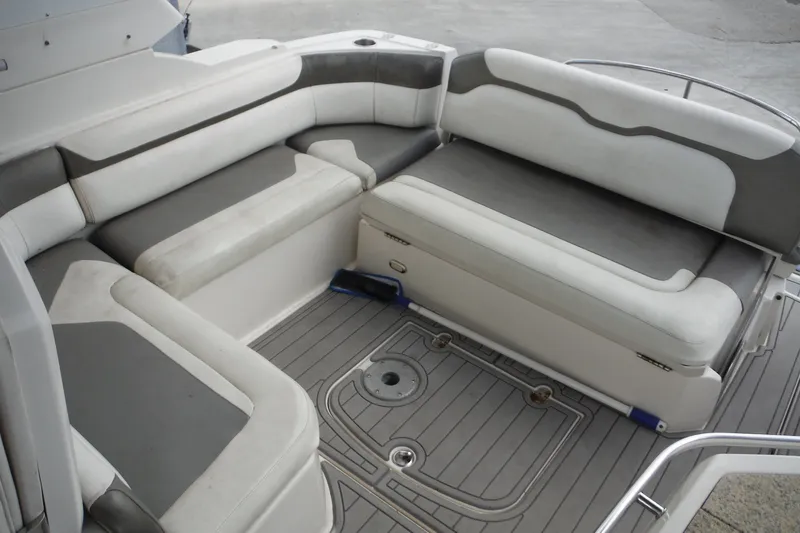 Slide: The Image of Spacious seating area on 2007 Monterey 330 Sport Yacht with gray and white upholstery. - 14