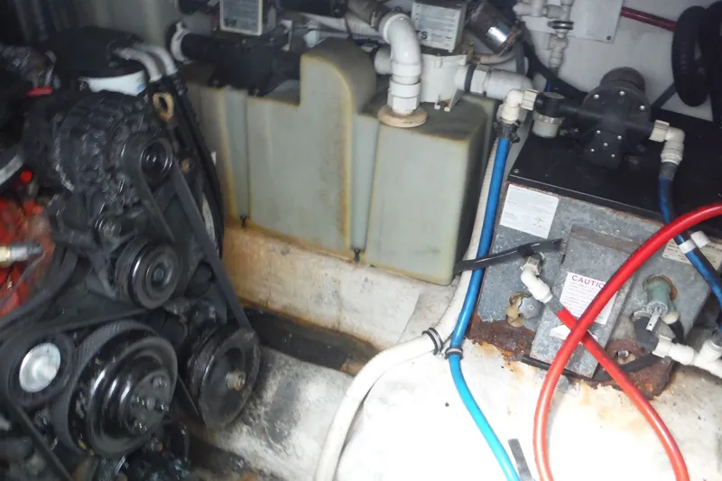 Slide: The Image of Engine compartment of a 2007 Monterey 330 Sport Yacht with visible belts and hoses. - 37