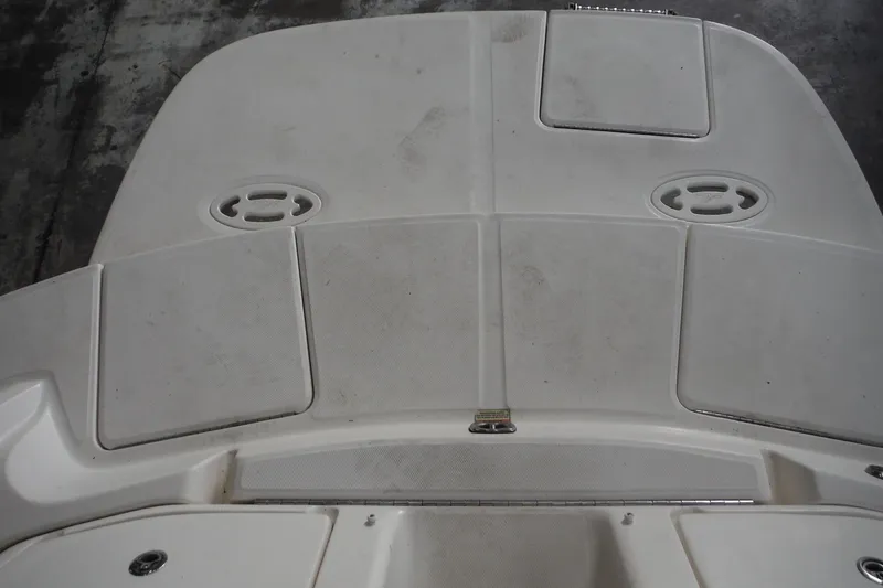 Slide: The Image of 2007 Sea Ray 290 SLX swim platform with storage hatches and non-slip surface. - 40