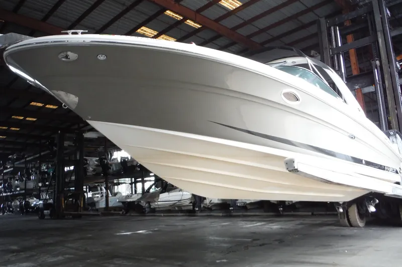 Slide: The Image of 2007 Sea Ray 290 SLX boat in indoor storage facility. - 4