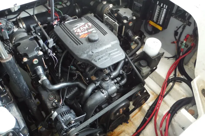 Slide: The Image of Engine compartment of a 2007 Sea Ray 290 SLX boat, showcasing mechanical components. - 31