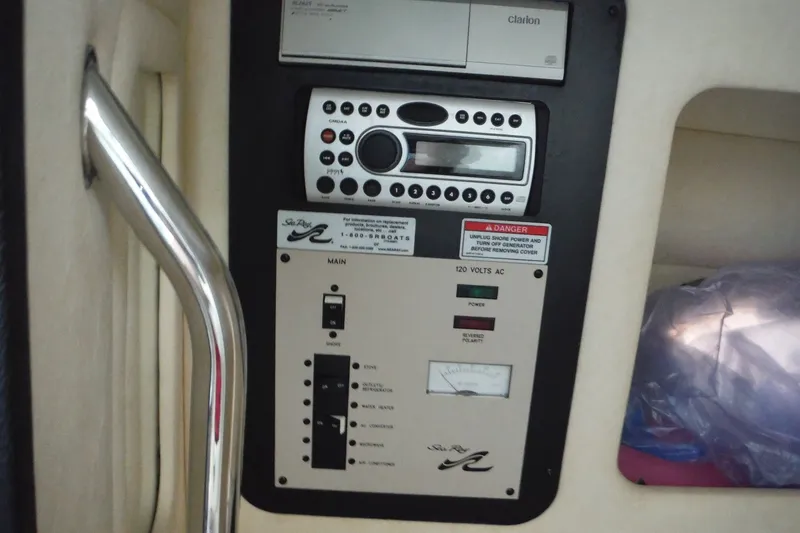 Slide: The Image of Control panel of a 2007 Sea Ray 290 SLX boat with Clarion audio system. - 27