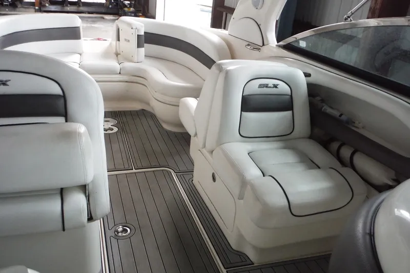 Slide: The Image of Luxurious interior of a 2007 Sea Ray 290 SLX boat with plush seating. - 19