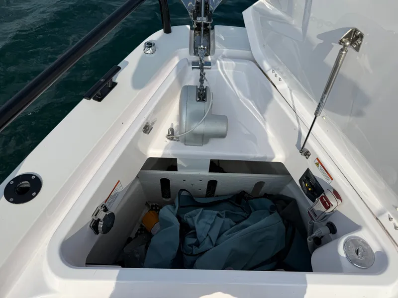 Slide: The Image of Anchor locker of an Axopar Brabus 37 XC Cross Cabin with anchor and storage space. - 39