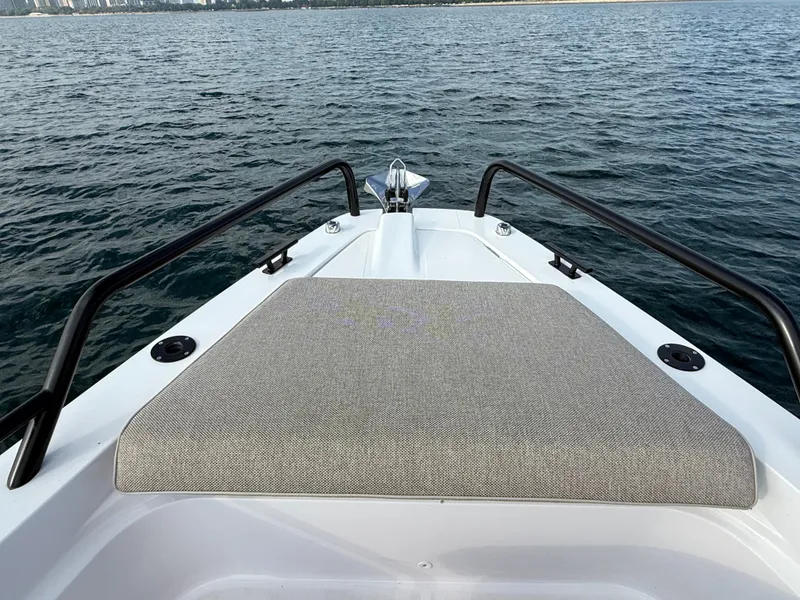 Slide: The Image of Bow view of the Axopar Brabus 37 XC Cross Cabin on the water. - 16