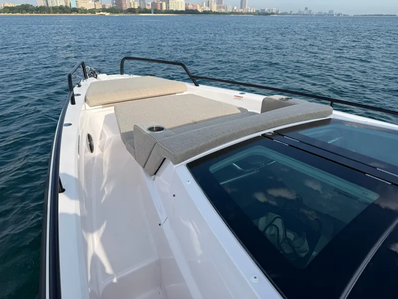 Slide: The Image of The 2023 Axopar Brabus 37 XC Cross Cabin features a sleek design with a spacious foredeck. - 14
