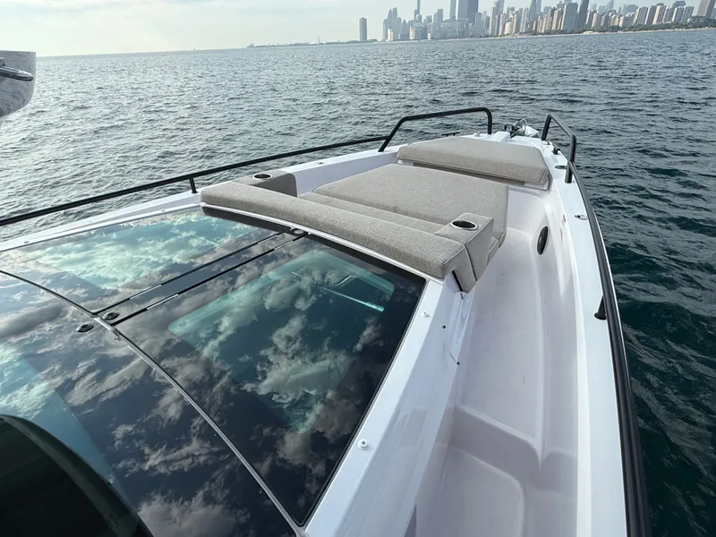 Slide: The Image of The 2023 Axopar Brabus 37 XC Cross Cabin features a sleek design with a spacious sun deck. - 15