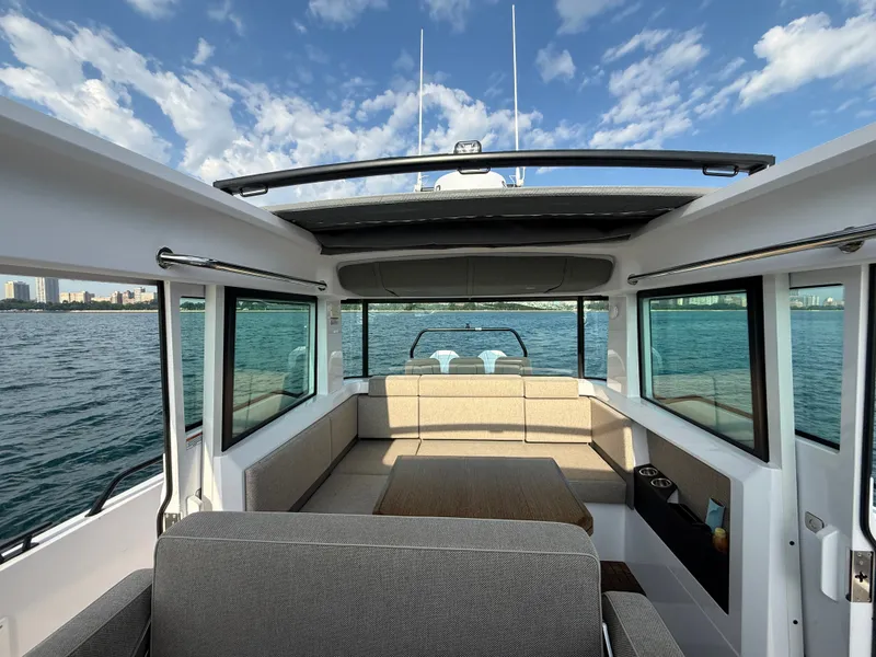 Slide: The Image of Interior of the 2023 Axopar Brabus 37 XC Cross Cabin with panoramic water views. - 19