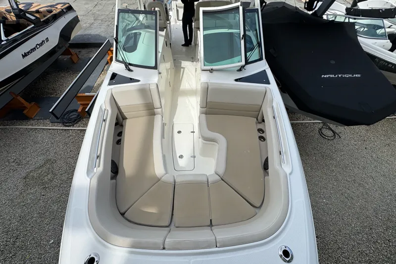 Slide: The Image of 2021 Boston Whaler 320 Vantage boat with spacious seating and open deck layout. - 84