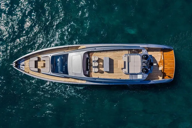 Slide: The Image of Aerial view of 2025 Pershing GTX 80 yacht on clear blue water. - 18