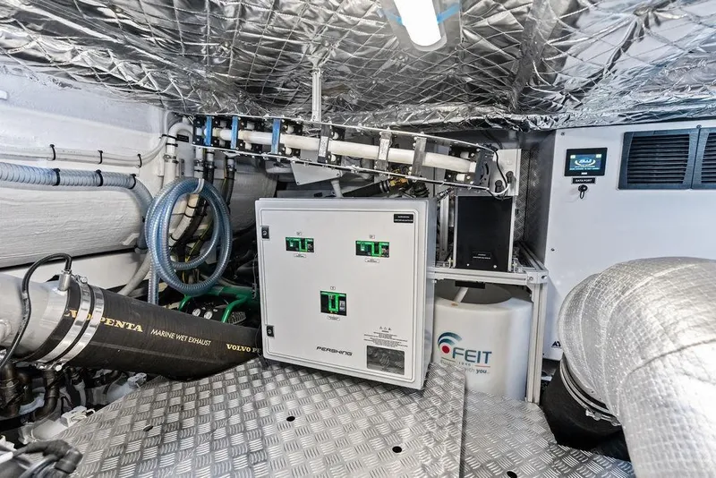 Slide: The Image of Engine room of 2025 Pershing GTX 80 yacht, featuring advanced marine equipment and systems. - 106