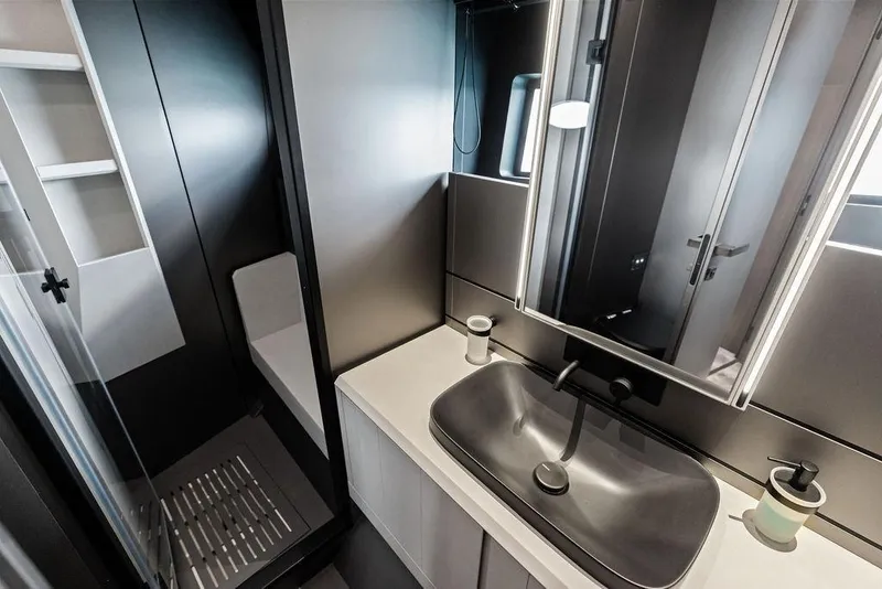 Slide: The Image of Modern bathroom interior of 2025 Pershing GTX 80 yacht, featuring sleek design and fixtures. - 80