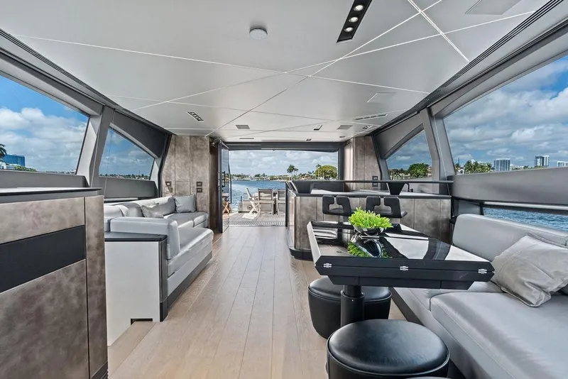 Slide: The Image of Luxurious interior of 2025 Pershing GTX 80 yacht with modern seating and ocean view. - 60