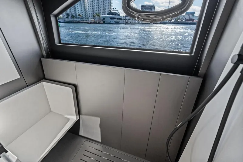 Slide: The Image of Interior view of 2025 Pershing GTX 80 yacht, featuring sleek design and waterfront window. - 88