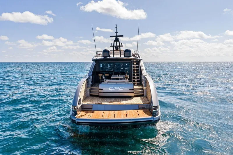 Slide: The Image of 2025 Pershing GTX 80 yacht cruising on open sea under clear skies. - 14