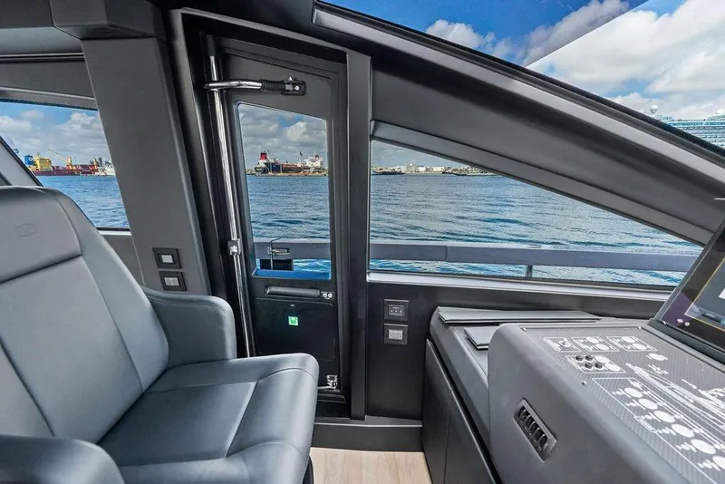 Slide: The Image of Interior view of 2025 Pershing GTX 80 yacht, featuring sleek design and ocean backdrop. - 65