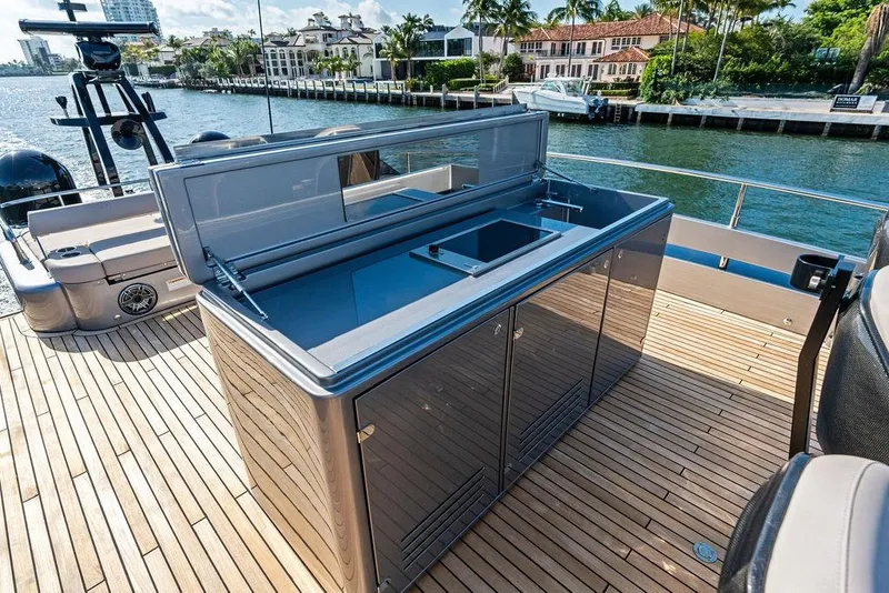 Slide: The Image of Luxury yacht Pershing GTX 80 (2025) with sleek outdoor kitchen on deck. - 34