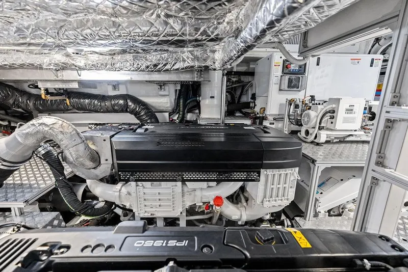 Slide: The Image of Engine room of 2025 Pershing GTX 80 yacht, showcasing advanced machinery and components. - 97