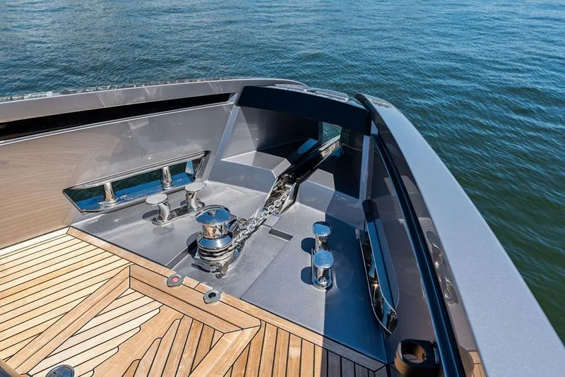 Slide: The Image of Bow of 2025 Pershing GTX 80 yacht with anchor and teak decking. - 47