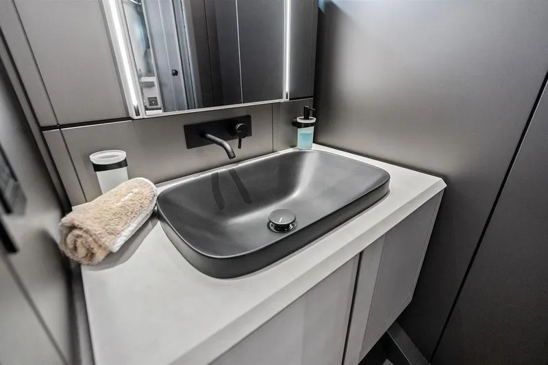 Slide: The Image of Modern bathroom sink in 2025 Pershing GTX 80 yacht, featuring sleek design and elegant fixtures. - 87
