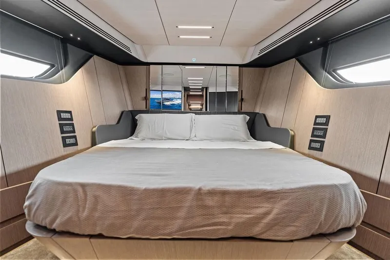 Slide: The Image of Luxurious bedroom interior of 2025 Pershing GTX 80 yacht with modern design elements. - 77