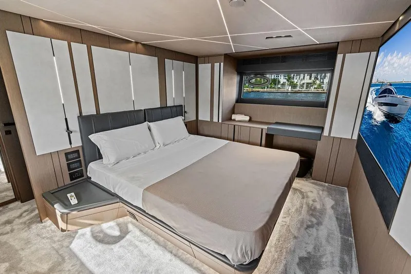 Slide: The Image of Luxurious bedroom interior of 2025 Pershing GTX 80 yacht with modern design and scenic window view. - 72