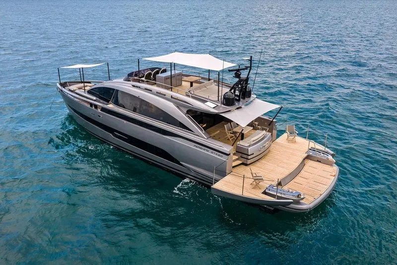 Slide: The Image of Luxurious 2025 Pershing GTX 80 yacht cruising on serene blue waters. - 6