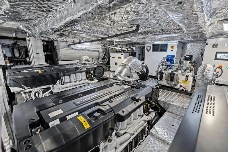 Slide: The Image of Engine room of 2025 Pershing GTX 80 yacht with Volvo Penta engines and advanced machinery. - 103