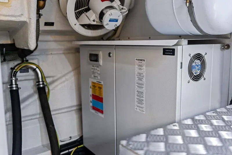 Slide: The Image of Engine room of 2025 Pershing GTX 80 yacht featuring Dometic equipment. - 100