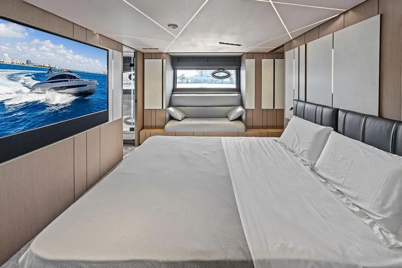 Slide: The Image of Luxurious interior of 2025 Pershing GTX 80 yacht with modern bedroom and ocean view. - 73