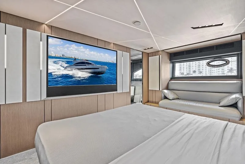 Slide: The Image of Luxurious interior of 2025 Pershing GTX 80 yacht with modern design and large screen. - 78