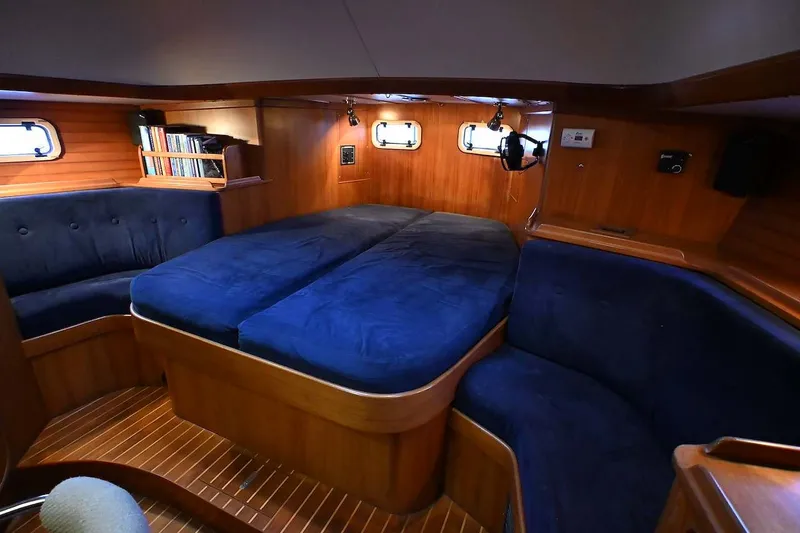 Slide: The Image of Luxurious interior of 1989 Ta Shing Yachts Taswell 43 with cozy seating and wooden finish. - 37