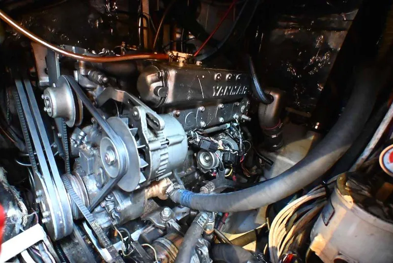 Slide: The Image of Engine compartment of a 1989 Ta Shing Yachts Taswell 43, featuring a Yanmar engine. - 80